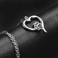 New Fashion Pet Dog Paw Hollow Love Footprints Necklace Wholesale main image 3