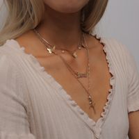 Mode Simple Fleur Creux Lettre Collier Rétro Mélange Et Match Rose Petit Papillon Collier Ensemble Nihaojewelry Gros main image 4