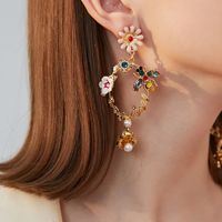 Fashion Girls Heart Oil Drop Flower Earrings Acrylic Diamond Bee Metal Texture Silver Needle Hypoallergenic Earrings main image 1