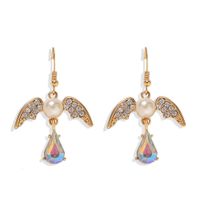 Fashion Retro Street Beat Ear Hook Women Multicolor Swallow Wings Inlaid Pearl Earrings Hot Selling Jewelry main image 5