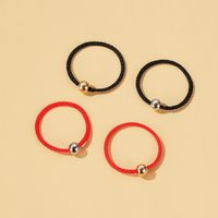 Hot Sale Transfer Bead Ring Natal Year Simple Men And Women Stretch Hand-woven Gold Beads Red Rope Ring Wholesale main image 1