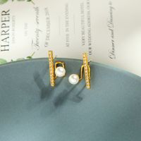 Korean Fashion Copper Zircon Diamond Earrings Niche Pearl Earrings Wind Creative Letter Earrings Wholesale main image 1