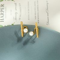Korean Fashion Copper Zircon Diamond Earrings Niche Pearl Earrings Wind Creative Letter Earrings Wholesale main image 2