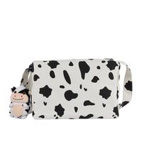 Korean New Simple Lazy Style Cute Cow Polka Dot Student Canvas Bag Class Bag Wild Messenger Bag Wholesale main image 6