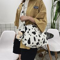 Korean New Simple Lazy Style Cute Cow Polka Dot Student Canvas Bag Class Bag Wild Messenger Bag Wholesale sku image 3