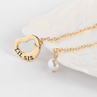 Explosion Necklace Clavicle Chain  Liltte Big Sister Good Sister Hollow Love Pearl Necklace Wholesale Nihaojewelry main image 3