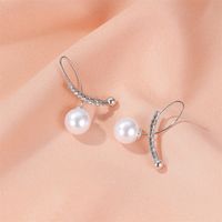 New Ear Clip Earrings Temperament Pearl Cross Earrings Ladies Sweet Wild Diamond Inlaid Earring Wholesale Nihaojewelry main image 5