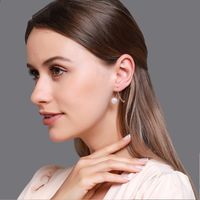 New Ear Clip Earrings Temperament Pearl Cross Earrings Ladies Sweet Wild Diamond Inlaid Earring Wholesale Nihaojewelry main image 6