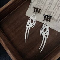 Cool Vague Sanskrit Alphabet Boucles D'oreilles Flamme M Mot Titane Acier Boucles D'oreilles Creux Boucles D'oreilles En Gros Nihaojewelry main image 4