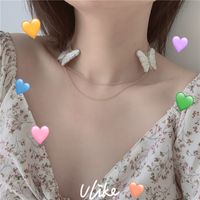 Butterfly On The Clavicle Double Tassel Choker White Cartilage Embroidery Double Butterfly Clavicle Chain Necklace Wholesale Nihaojewelry main image 1