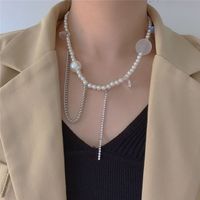 Korea Pearl Necklace Women Sweet Wind Transparent Acrylic Size Planet Chain Tassel Necklace Crystal Love Pearl Clavicle Chain Wholesale Nihaojewelry main image 1