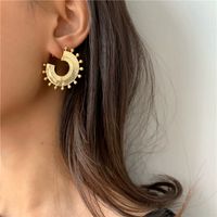 Sun Disc Exotic Bead Carving Earrings Designer Simple Metal Niche Earrings Wholesale Nihaojewelry main image 1