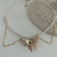 Corée Nouveau Self-made Double Couche Perle Papillon Collier Ras Du Cou Chaîne De Clavicule En Gros Nihaojewelry sku image 1