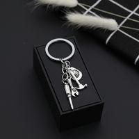 Explosion Keychain New Keychain Father&#39;s Day Gift Cowboy Hat Tool Three-piece Keychain Wholesale Nihaojewelry main image 4