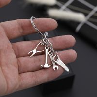 Explosion Keychain Personality Father's Day Gift Tool Four-piece Metal Keychain Pendant Jewelry Wholesale Nihaojewelry main image 3