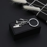 Explosion Keychain Personality Father's Day Gift Tool Four-piece Metal Keychain Pendant Jewelry Wholesale Nihaojewelry main image 5