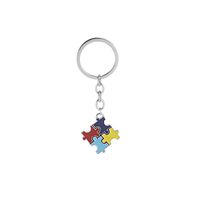Fashion Explosion Key Chain Children's Four-color Puzzle Drip Oil Key Chain Small Pendant Jewelry Wholesale Nihaojewelry main image 1