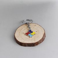 Fashion Explosion Key Chain Children's Four-color Puzzle Drip Oil Key Chain Small Pendant Jewelry Wholesale Nihaojewelry main image 4
