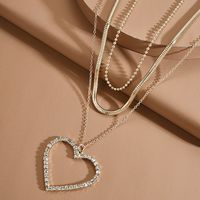 New Creative Hollowed Out Love Alloy Diamond Pendant Multilayer Necklace Nihaojewelry Wholesale main image 5