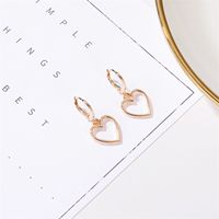 New Fashion Simple Hollow Love Earrings Wild Metal Peach Heart Earrings Wholesale Nihaojewelry main image 4