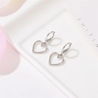 New Fashion Simple Hollow Love Earrings Wild Metal Peach Heart Earrings Wholesale Nihaojewelry main image 5