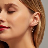 New Fashion Simple Hollow Love Earrings Wild Metal Peach Heart Earrings Wholesale Nihaojewelry main image 6