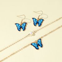 Commerce Extérieur Nouvel Ensemble Papillon Collier Couleur Double-couche Perle Papillon Pendentif Dame Tempérament Élégant Papillon Boucles D'oreilles main image 3