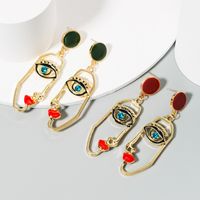 Exaggerated Personality Asymmetry Human Face Red Lips Alloy Diamond Drop Oil Earrings S925 Silver Needle Long Earrings Wholesale Nihaojewelry main image 1