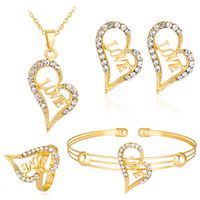 Nouvelles Lettres Creuses Amour Amour Diamant Placage Kc Collier Boucles D&#39;oreilles Bague Bracelet Quatre Pièces En Gros Nihaojewelry main image 2