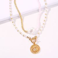New Trend Jewelry Creative Two-color Stitching Pearl Necklace Alloy Hollow Pendant Necklace Wholesale Nihaojewelry main image 4
