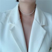 Niche Conception Rétro Multicouche Mil Perle Chaîne De Clavicule Grain De Riz Collier De Perles En Gros Nihaojewelry main image 1