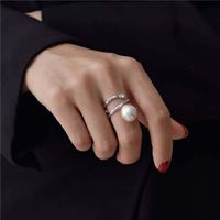 Korea Open Spiral Ring Designer Models Metal Pearl Ring Wholesale Nihaojewelry main image 1