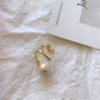 Korea Open Spiral Ring Designer Models Metal Pearl Ring Wholesale Nihaojewelry sku image 1