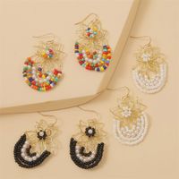 Korean Cute Hand-woven Flowers Rice Beads Resin Earrings Jewelry Wholesale Nihaojewelry main image 1