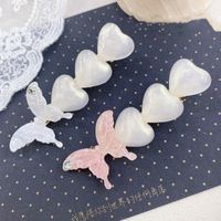 South Korea Butterfly Pearl Rhinestone Side Clip Simple Fashion Love Cute Hairpin Wholesale Nihaojewelry main image 1