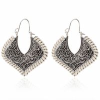 Exaggerated Hollow Carved Earrings Retro Simple Metal Braided Flower Earrings main image 4