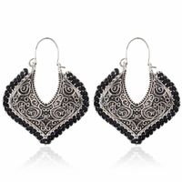 Exaggerated Hollow Carved Earrings Retro Simple Metal Braided Flower Earrings main image 5