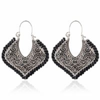 Exaggerated Hollow Carved Earrings Retro Simple Metal Braided Flower Earrings sku image 4