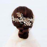 New Bridal Jewelry Pearl Crystal Hair Band Metal Leaves Hand Comb Soft Ceramic Flower Hair Comb Wholesale Nihaojewelry main image 3