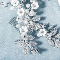 New Bridal Jewelry Pearl Crystal Hair Band Metal Leaves Hand Comb Soft Ceramic Flower Hair Comb Wholesale Nihaojewelry main image 5