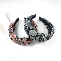 Fashion  Snakeskin Knotted Headband Wide-brimmed Fabric Printing Crease Hairpin Serpentine Fold Pressure Headband Wholesale Nihaojewelry main image 5