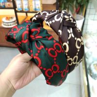 Korean Wide-brimmed Alphabet Printing Knotted Headband High-end Fabric Simple Hairpin Fashion Pressure Hair Head Cave Hair Hoop Ladies Wholesale Nihaojewelry main image 3