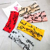 Korean Fashion Wide-brimmed Knitted Wool Cross Hairband Retro Alphabet Smiley Headband Simple Super Fairy Elastic Hair Accessories Wholesale Nihaojewelry main image 1