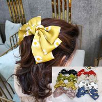 Korean Fashion Section Small Daisy Hair Clip High-end Fabric Simple Hairpin Super Fairy Bowknot Clip Hair Accessories Wholesale Nihaojewelry main image 1