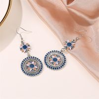 New Retro Palace Style Carved Metal Flower Totem Earrings Color Dripping Long Small Daisies Wholesale Nihaojewelry main image 1