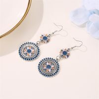 New Retro Palace Style Carved Metal Flower Totem Earrings Color Dripping Long Small Daisies Wholesale Nihaojewelry main image 4