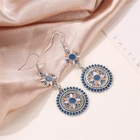 New Retro Palace Style Carved Metal Flower Totem Earrings Color Dripping Long Small Daisies Wholesale Nihaojewelry main image 5