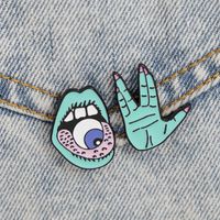 New Brooch Punk Style Cartoon Thrill Mouth Eyeball Green Magic Palm Alloy Drop Oil Brooch Wholesale Nihaojewelry main image 1