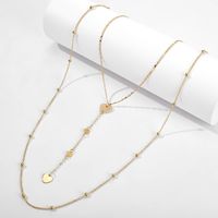 New Creative Fashion Alloy Multi-layer Round Bead Love Tassel Necklace Heart-shaped Sweater Chain Wholesale Nihaojewelry main image 4