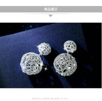 Korean Retro Hollow Ball Double-sided Earrings Popular Exaggerated Fashion Earrings Wholesale Nihaojewelry main image 4